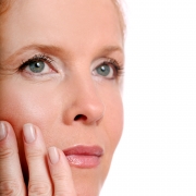 beautiful-middle-age-woman-touch-her-face